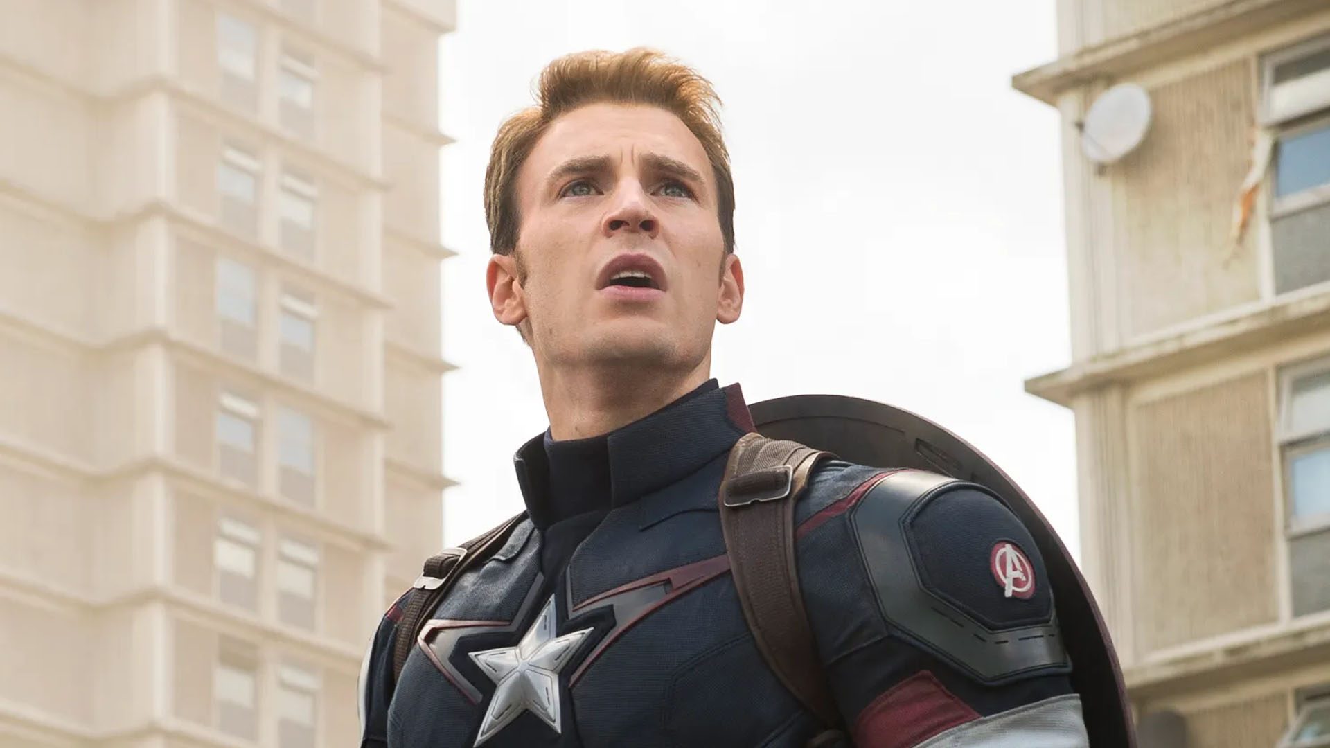 Chris Evans looks into the distance heroically in a still from the movie The Avengers.