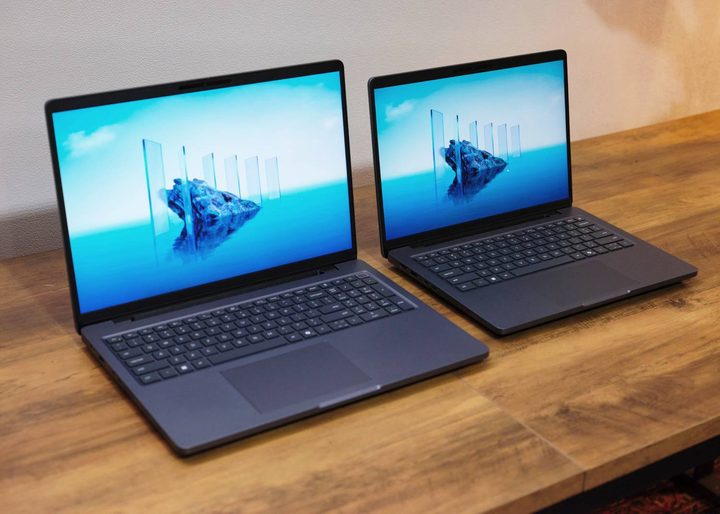 The Dell Pro Max 14 and 16 on a wooden table.