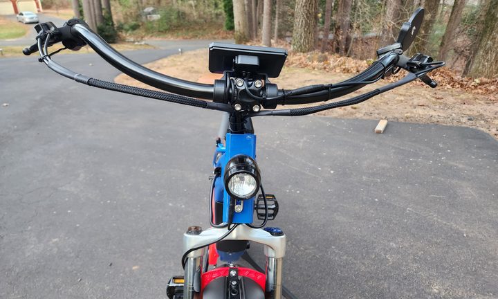 Electric Bike Company Model R front view of headlamp and carefully managed cables.