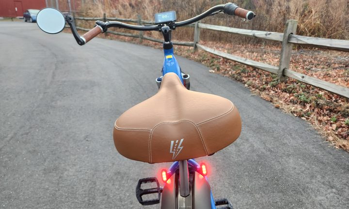 Electric Bike Company Model R rear view showing taillights and the view over the saddle including the handlebars.