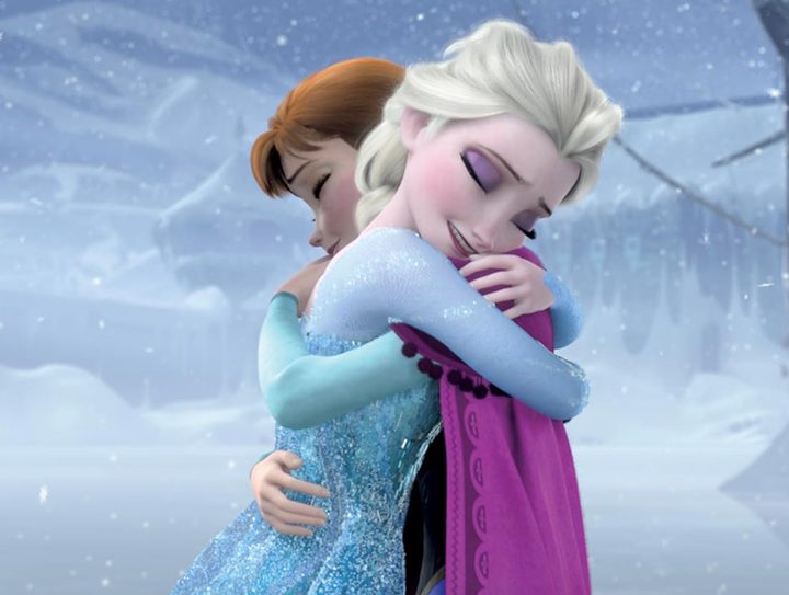 Two girls hug in Frozen.