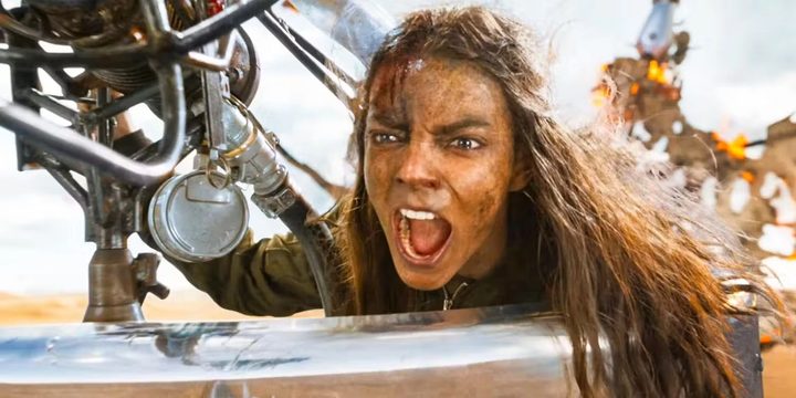 Furiosa screams while aiming her gun in Furiosa.
