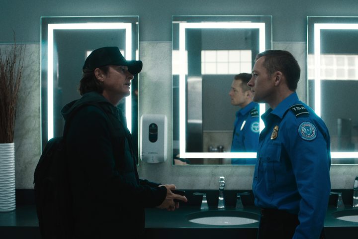 Jason Bateman and Taron Egerton face each other in Carry-On.