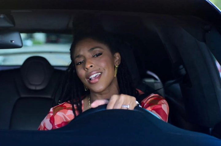 Jessica Williams sits behind the wheel of a car in Shrinking.