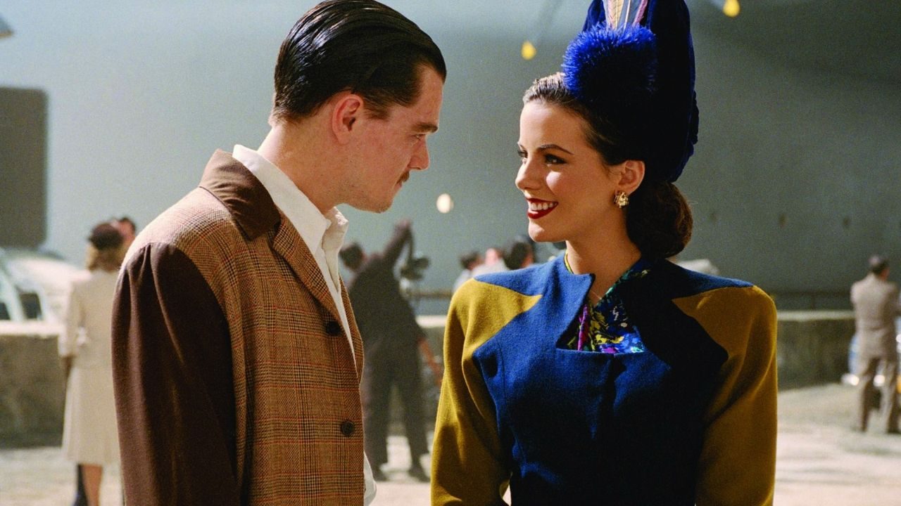 Leonardo DiCaprio and Kate Beckinsale as Howard Hughrs and Ava Gardner smiling at each other in The Aviator.