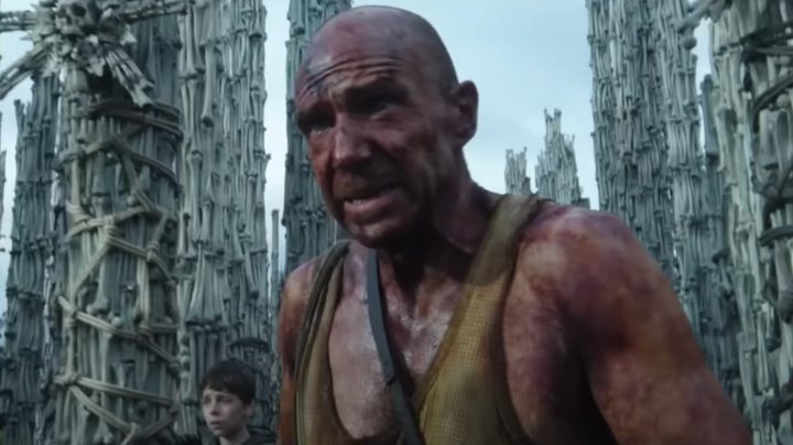 A bloody Ralph Fiennes walks toward the camera in "28 Years Later."