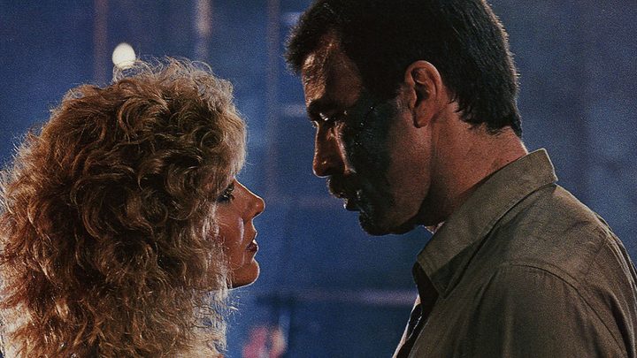 Cynthia Rhodes and Tom Selleck in Runaway.