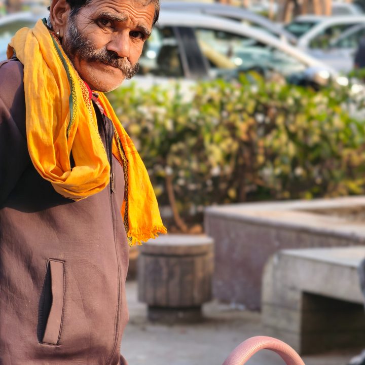 Indian street vendor with a majestic mustache captured with the Vivo X200 Pro.