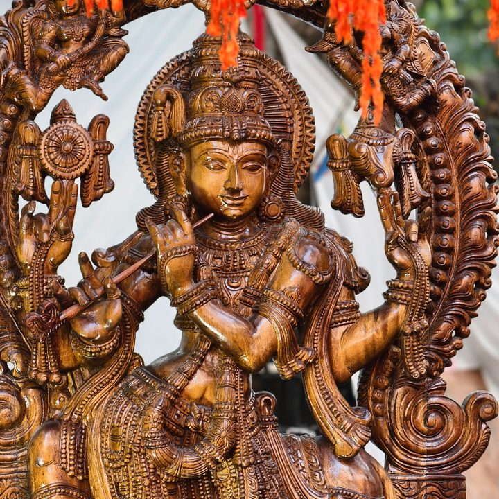 Wooden status of Hindu god captured with the Vivo X200 Pro.