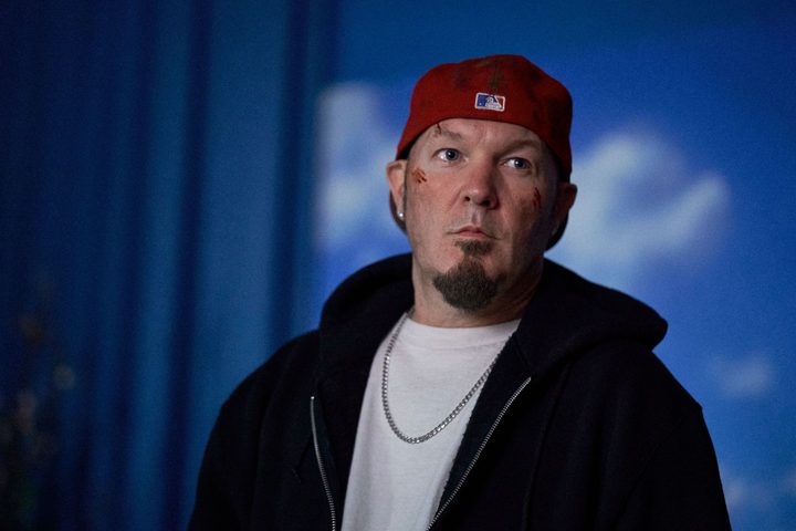 Fred Durst stands and stares in Y2K.
