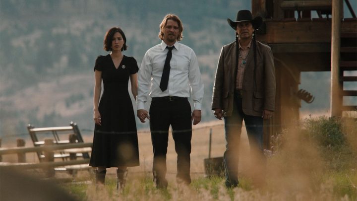 Kelsey Asbille, Luke Grimes, and Moses Brings Plenty in Yellowstone.