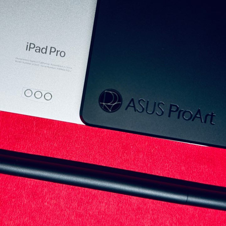 Asus ProArt PZ13 with iPad Pro and stylus.