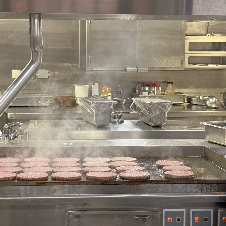 Burgers grilling in the galley aboard Royal Caribbean Allure of the Seas in December 2024 (captured on the iPhone 16 Pro)