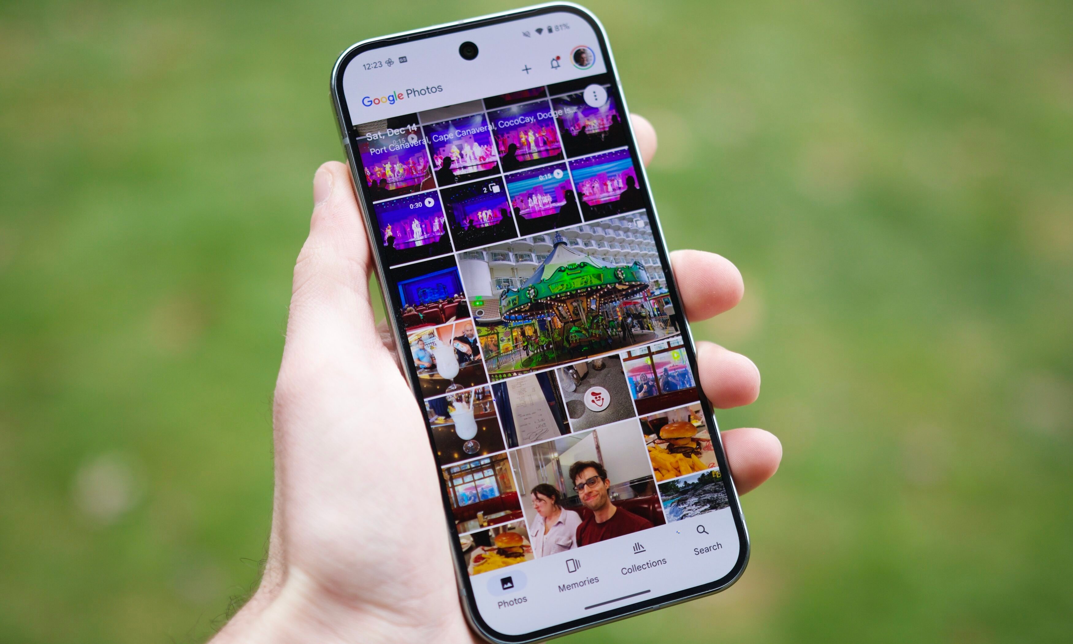Someone holding a Pixel 9 Pro, running the Google Photos app.