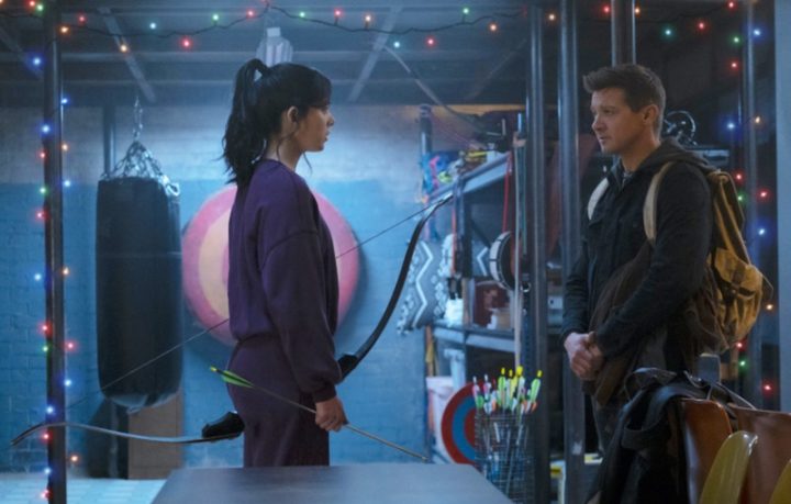 A man and a woman look at each other in Hawkeye.
