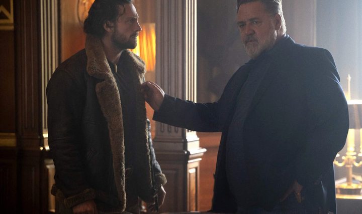 A man talks with his dad in Kraven the Hunter.