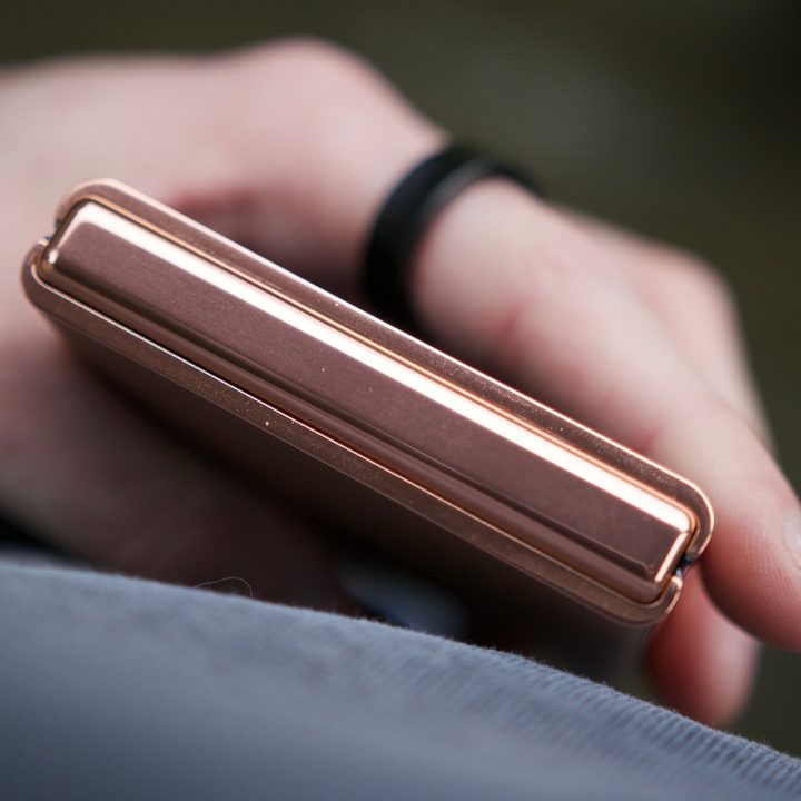 Gold accents on the Mocha Mousse Motorola Razr Plus.