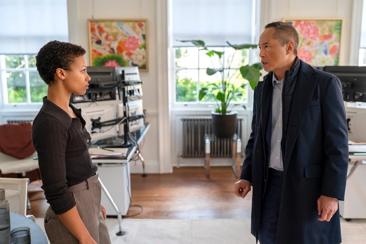 Myha’la and Ken Leung speak to each other in Industry.
