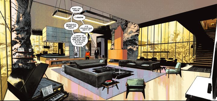 Two people walk into a living room in The Nice House by the Lake.