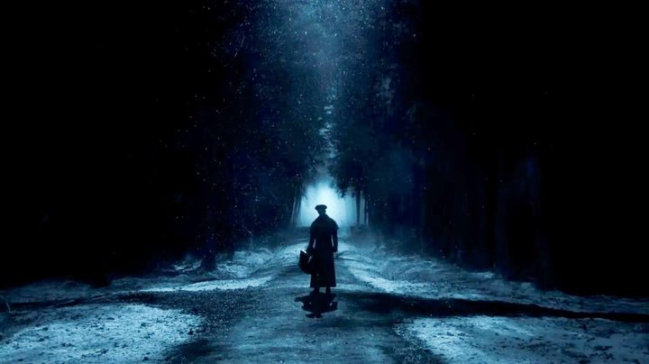 A man stands in a road in Nosferatu.