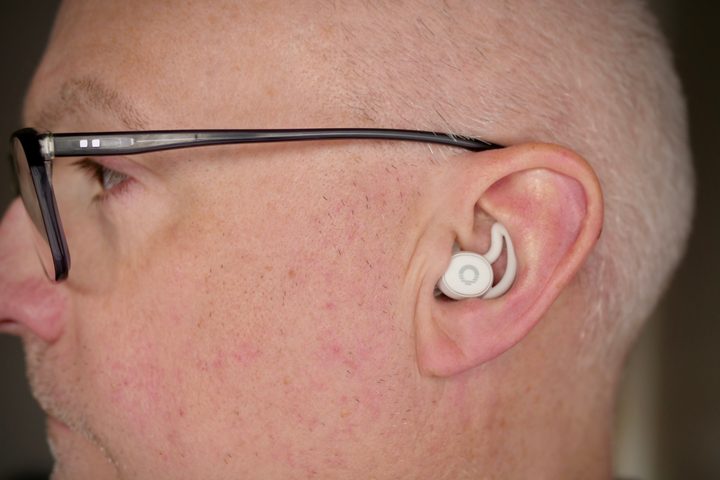 A person wearing the Ozlo Sleepbuds.