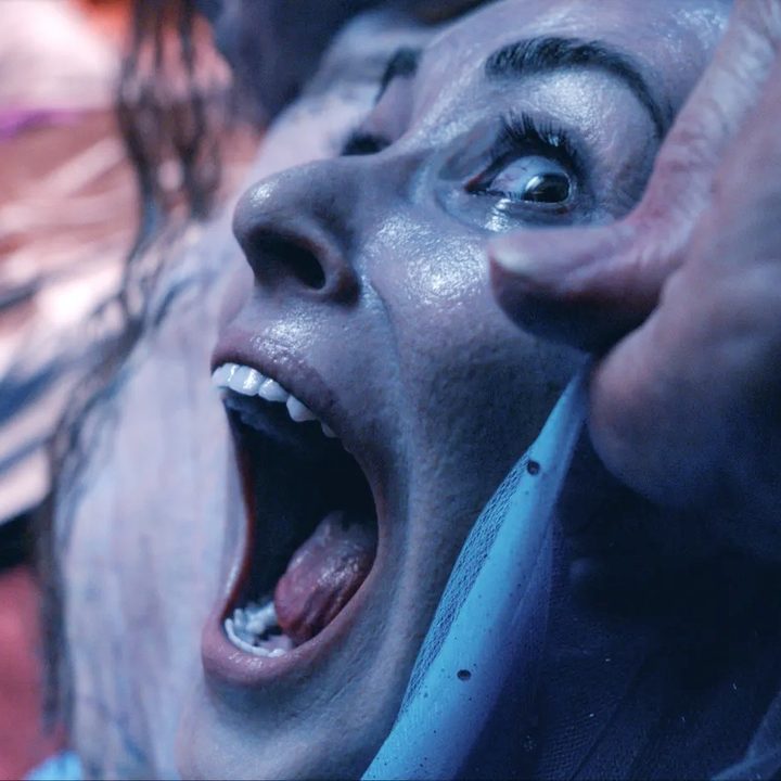 Demi Moore screams and monsters out in a still from the movie The Substance.