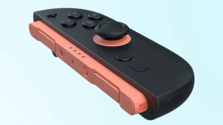 A black and pink Switch 2 joy-con.