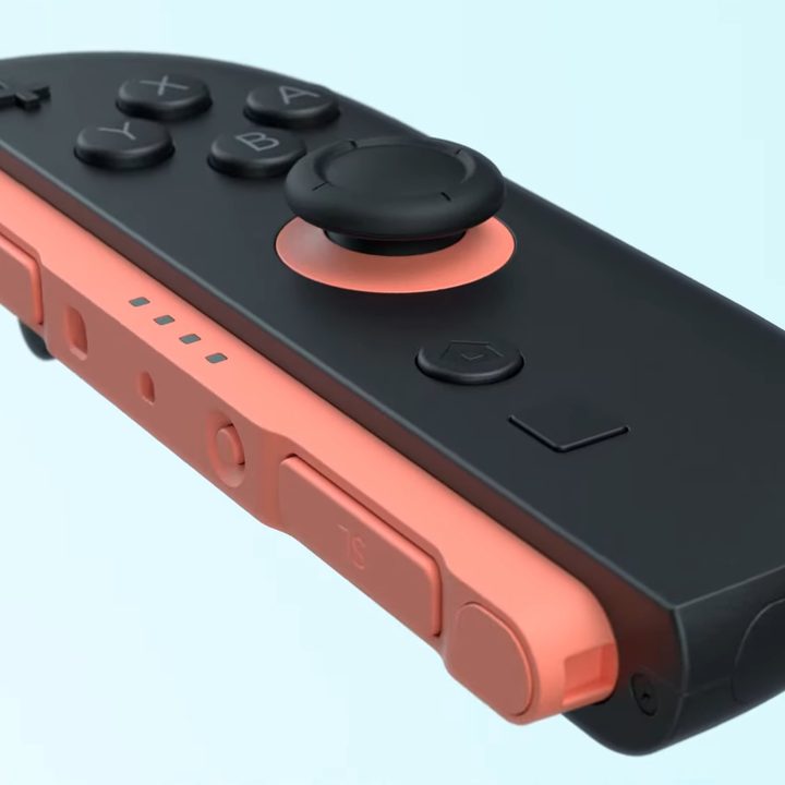 A black and pink Switch 2 joy-con.