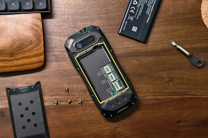 Four screws holding Blackview N1000 rugged phone's back in place.