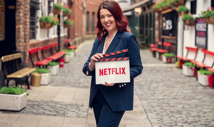 A woman poses on the set of How to get into Heaven from Belfast.