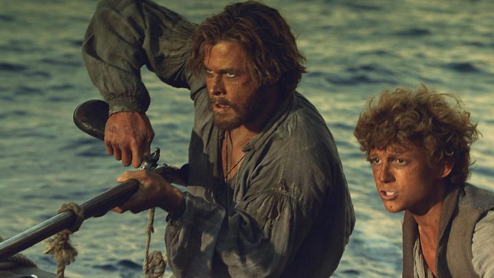 Chris Hemsworth and Tom Holland together in a scene from In the Heart of the Sea.
