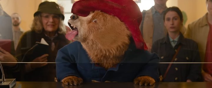 Paddington pressing his face against glass in "Paddington in Peru."