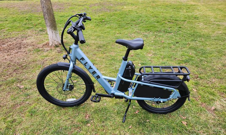 Radio Flyer Flex e-bike left side parked on grass.
