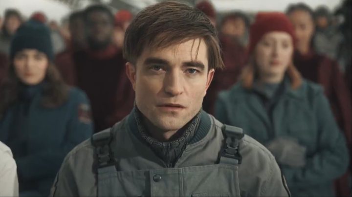 Robert Pattinson stares with a confused look in Mickey 17.