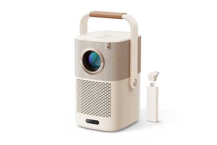 The Yaber T2 Plus 1080p projector with its streaming dongle.