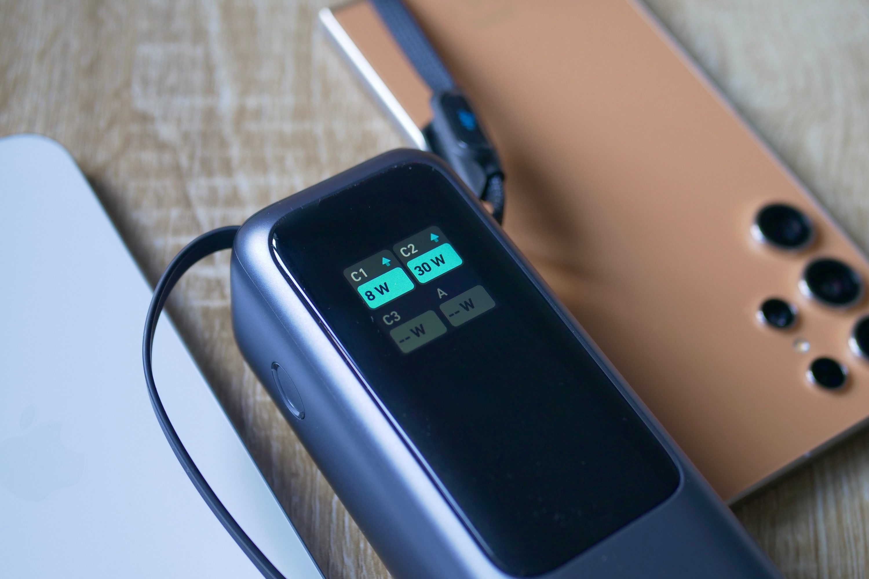 Charging information on the Anker 165W Power Bank.