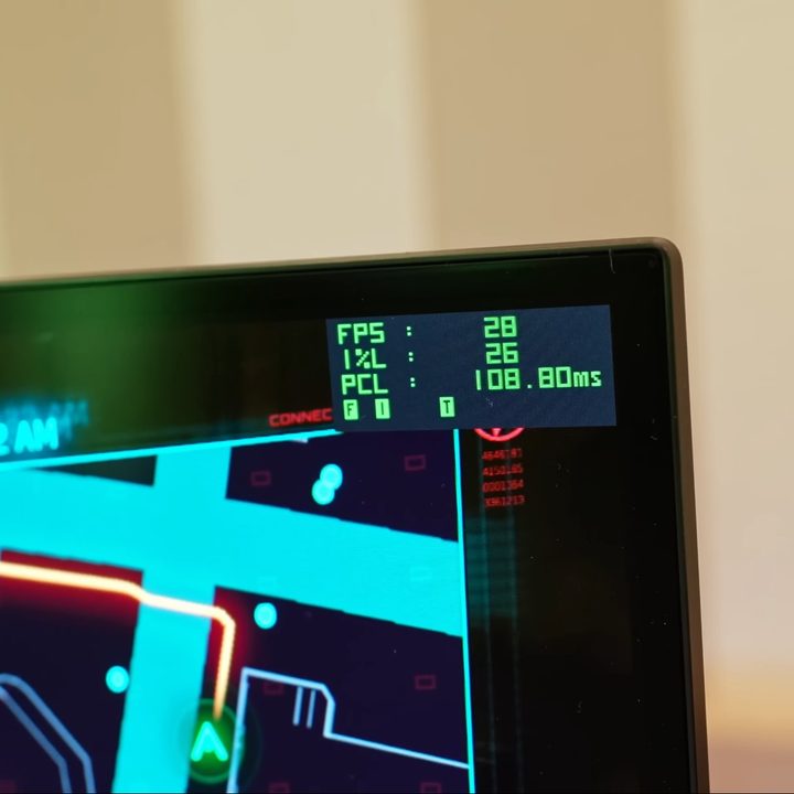A picture of the corner of a monitor running Cyberpunk 2077.