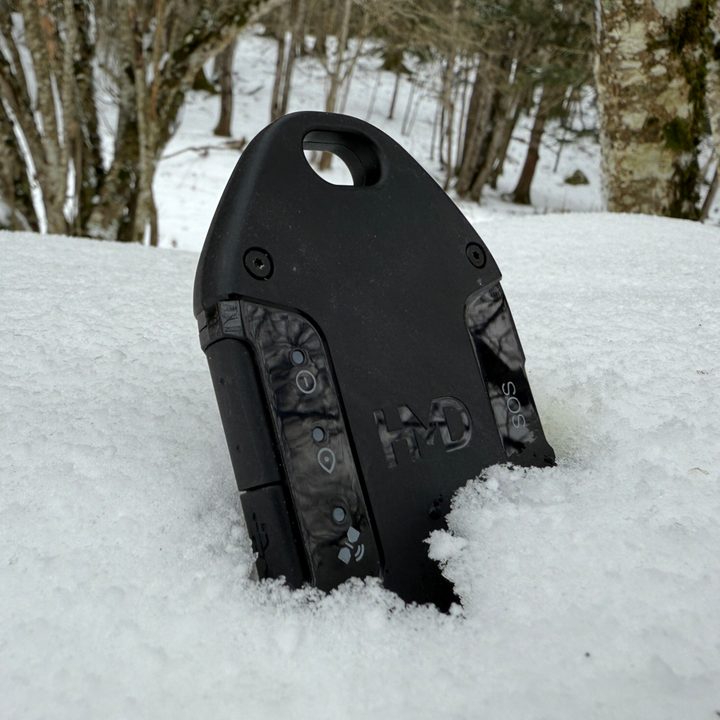 The HMD OffGrid sitting upright in a pile of snow.