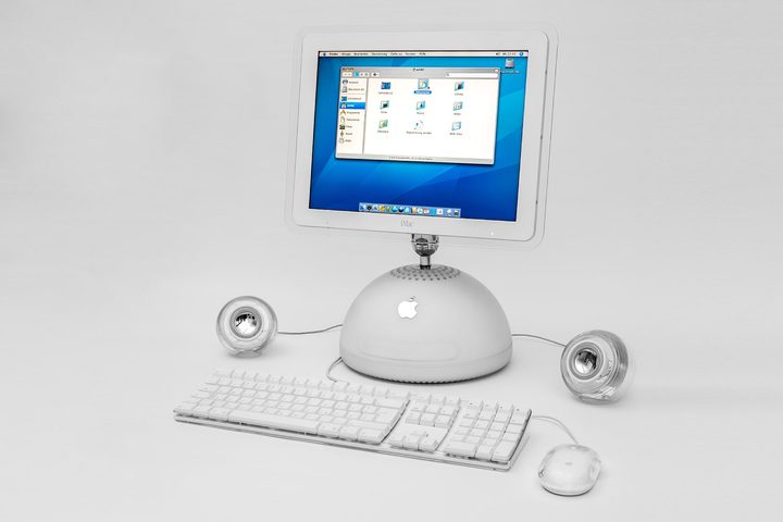 An Apple iMac G4 on a desk.