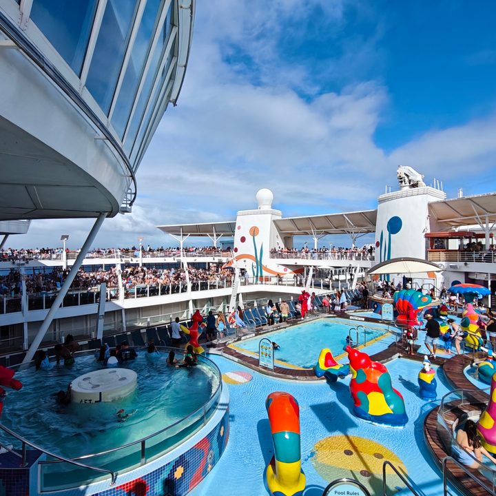 A photo of pools on a cruise ship in the background, taken with the OnePlus 13R.