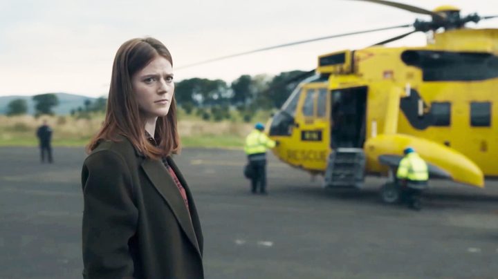 A woman looks concerned in Vigil.