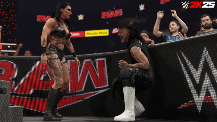 Rhea Ripley beats up Dom Mysterio in WWE 2K25.