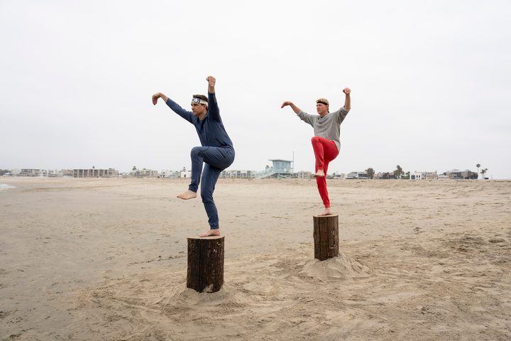 Daniel and Johnny stand on stumps and kick in Cobra Kai season 6.