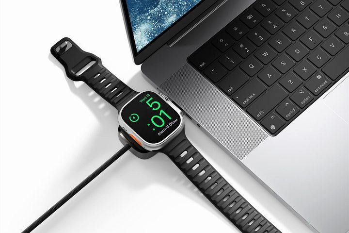 The Nomad Universal Cable for Apple Watch being used to charge Apple devices.
