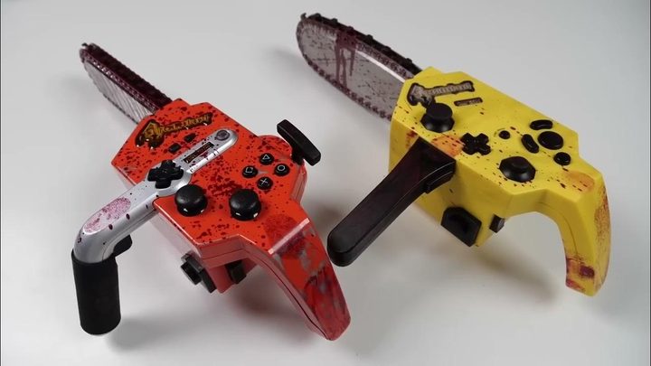 A red and yellow chainsaw controller.