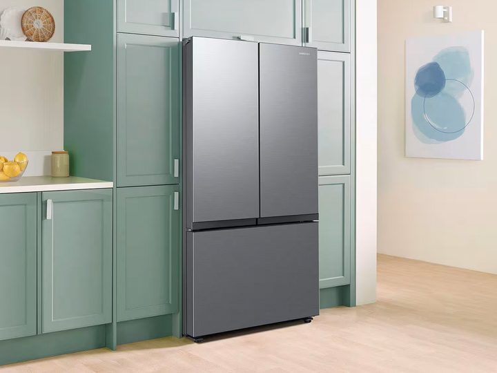 The Samsung 27 cu. ft. 3-Door French Door Counter Depth Smart Refrigerator in the kitchen.