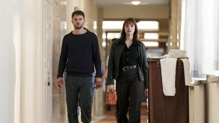 Jeremy Irvine and Emilia Schüle in Treadstone.