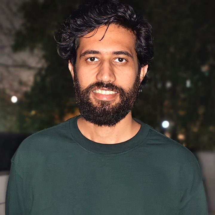 Portrait of a man at night shot on Vivo V50 with Zeiss effects and Aura Light.