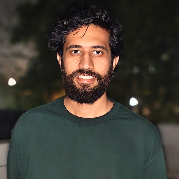 Portrait of a man at night shot on Vivo V50 with Zeiss effects and Aura Light.