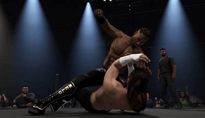 Carmelo Hayes beats up a wrestler in WWE 2K25.
